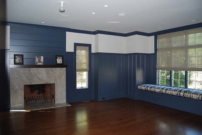 Interior of a bedroom with blue walls
