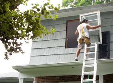 A man fixing the window