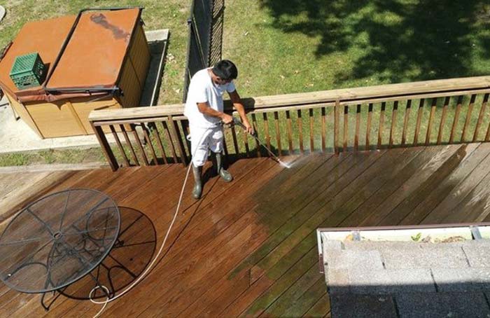 Man cleaning the outdoor space